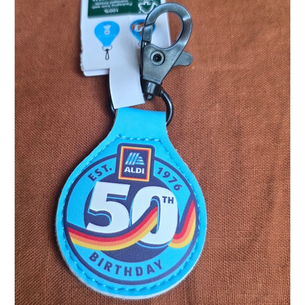 Aldi Keychain Quarter Holder Collectible Blue New 50th Birthday Anniversary Logo